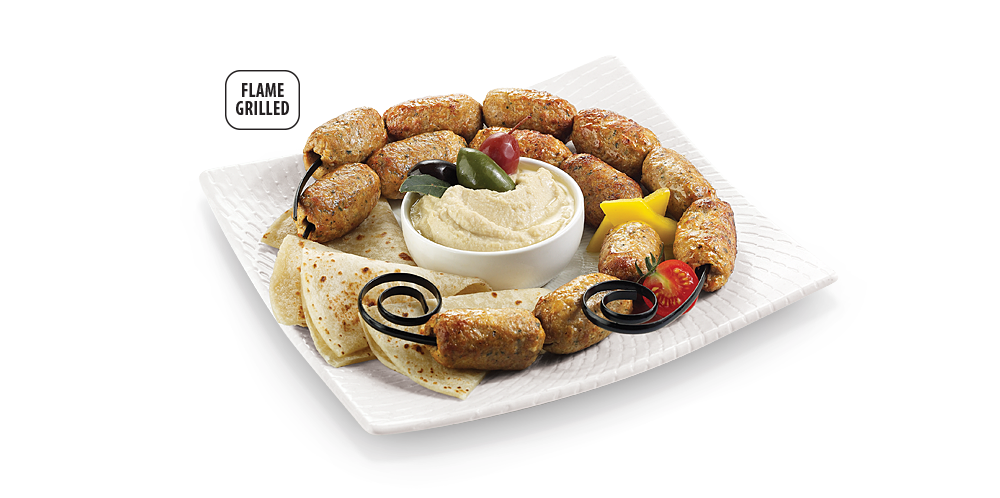 Kafta Kabab (Ground chicken meat with fresh mint, shaped and flame grilled on skewers)